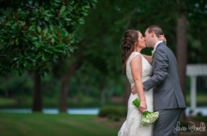 Julie + Kevin - Golden Eagle Country Club Wedding in August - B+ G Kissing