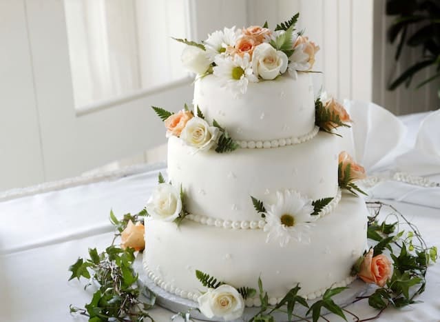 Wedding Traditions Couples are Ditching - Tiered Wedding Cake